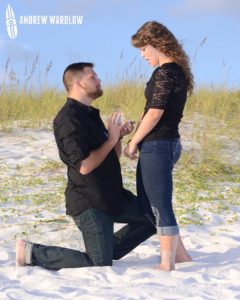 A man proposes to a woman on the beach in Panama City Beach, Florida.