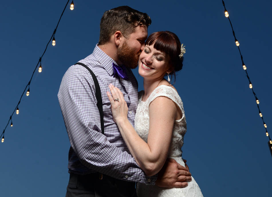 Photo of a man giving a woman a kiss after they were married by Panama City Beach photographer Andrew Wardlow.