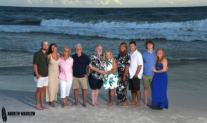 A large family poses for a photo near the Gulf of Mexico in Panama City Beach, Florida.