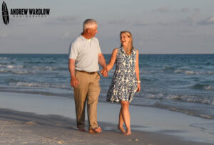 A couple walks along the beach in Panama City Beach, Florida.
